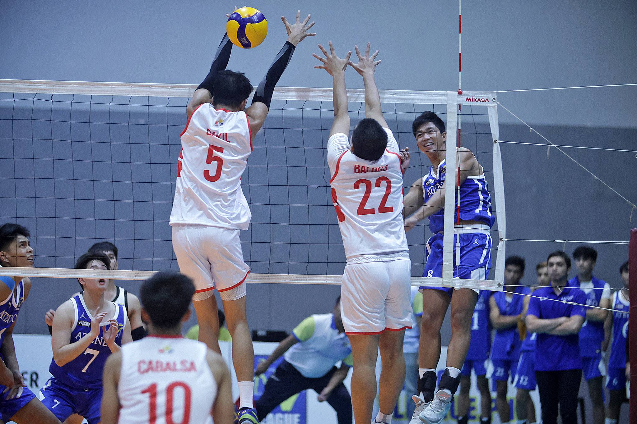 Ateneo fends off San Beda to take share of lead