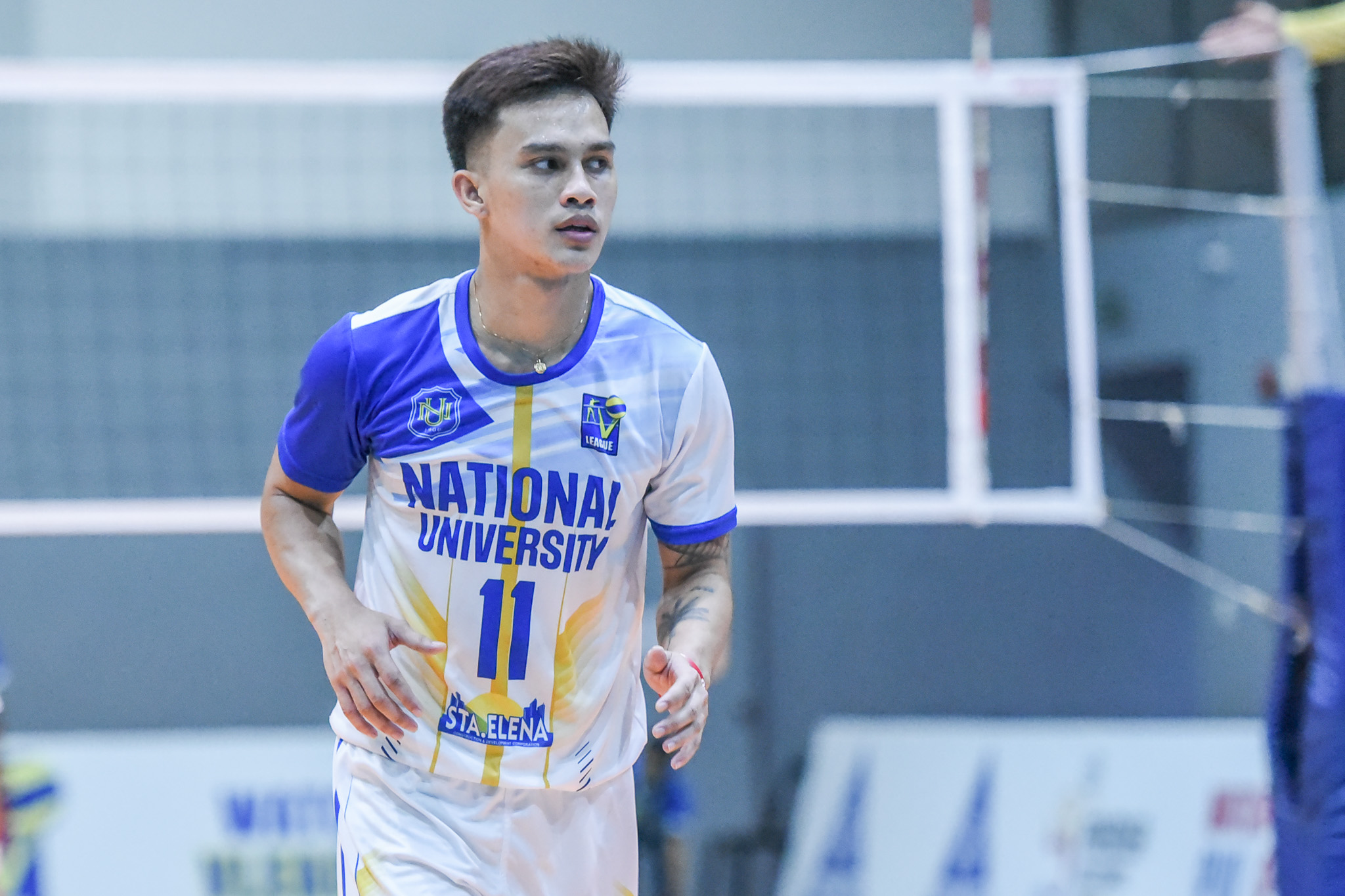 NU turns back Arellano, nears quarters